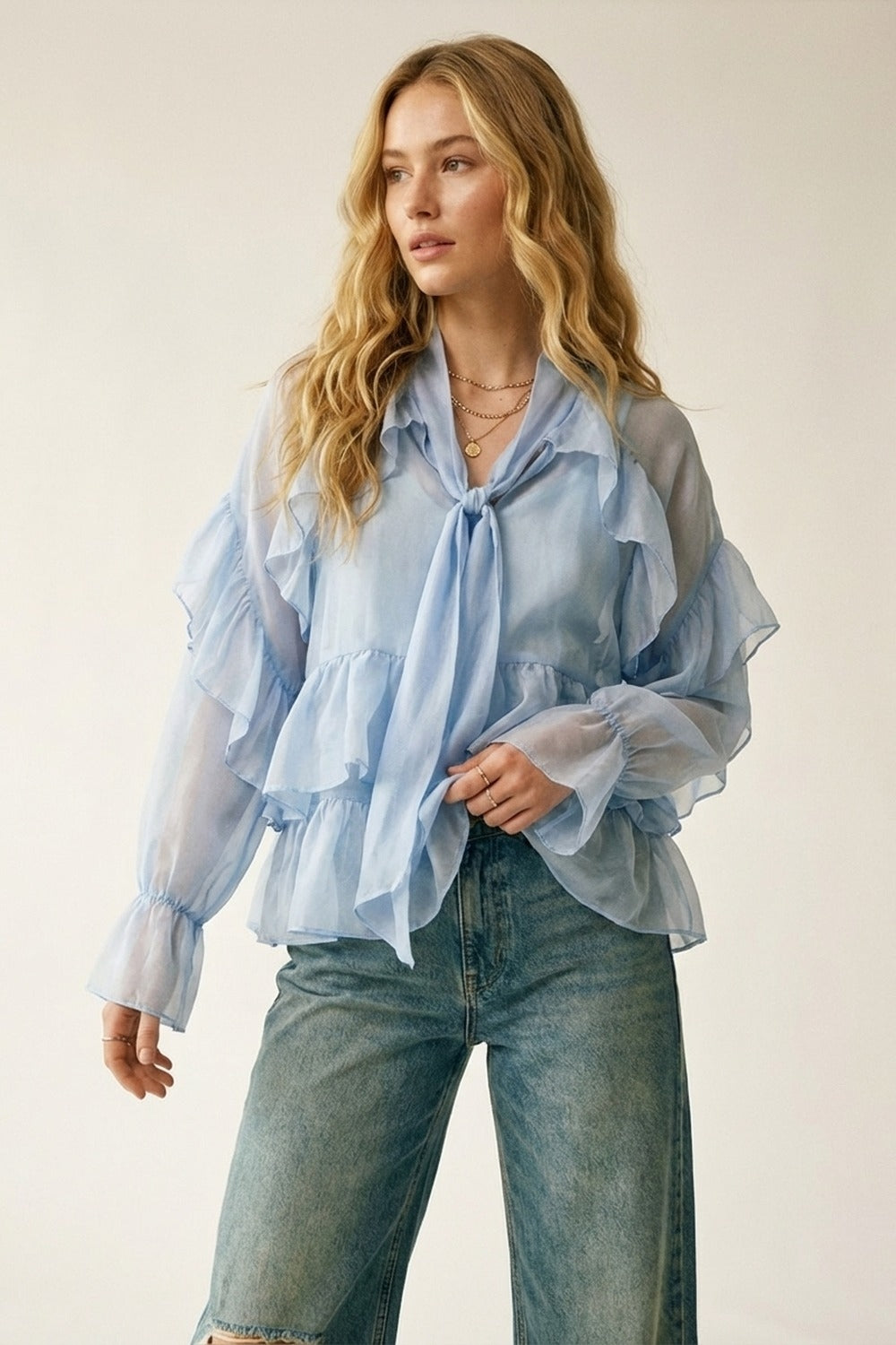Q2 Blouse en mousseline de soie à volants bleu clair en tissu de chiffon