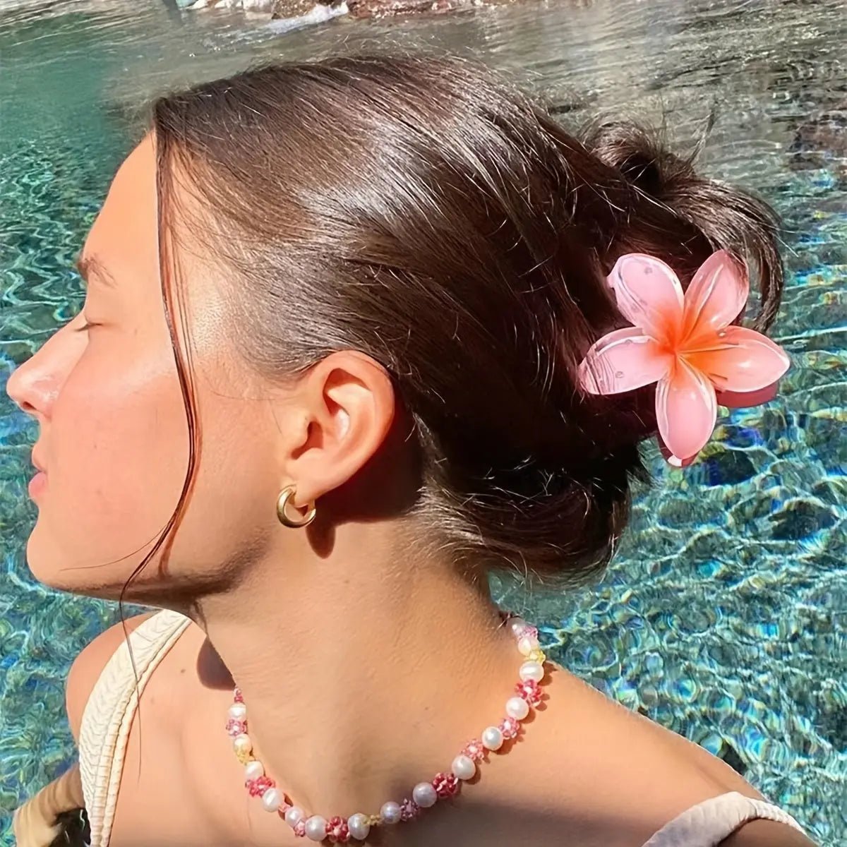 Pince Γ  Cheveux Fleur de Frangipanier β LβΓlΓ©gance Exotique Γ  PortΓ©e de Main - La boutique de Nannye