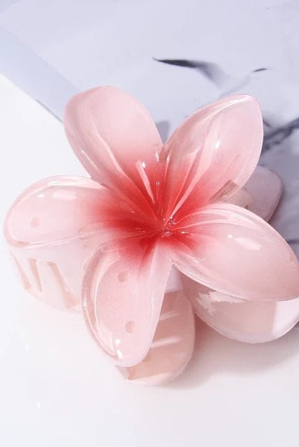 Pince à Cheveux Fleur de Frangipanier – L’Élégance Exotique à Portée de Main - La boutique de Nannye