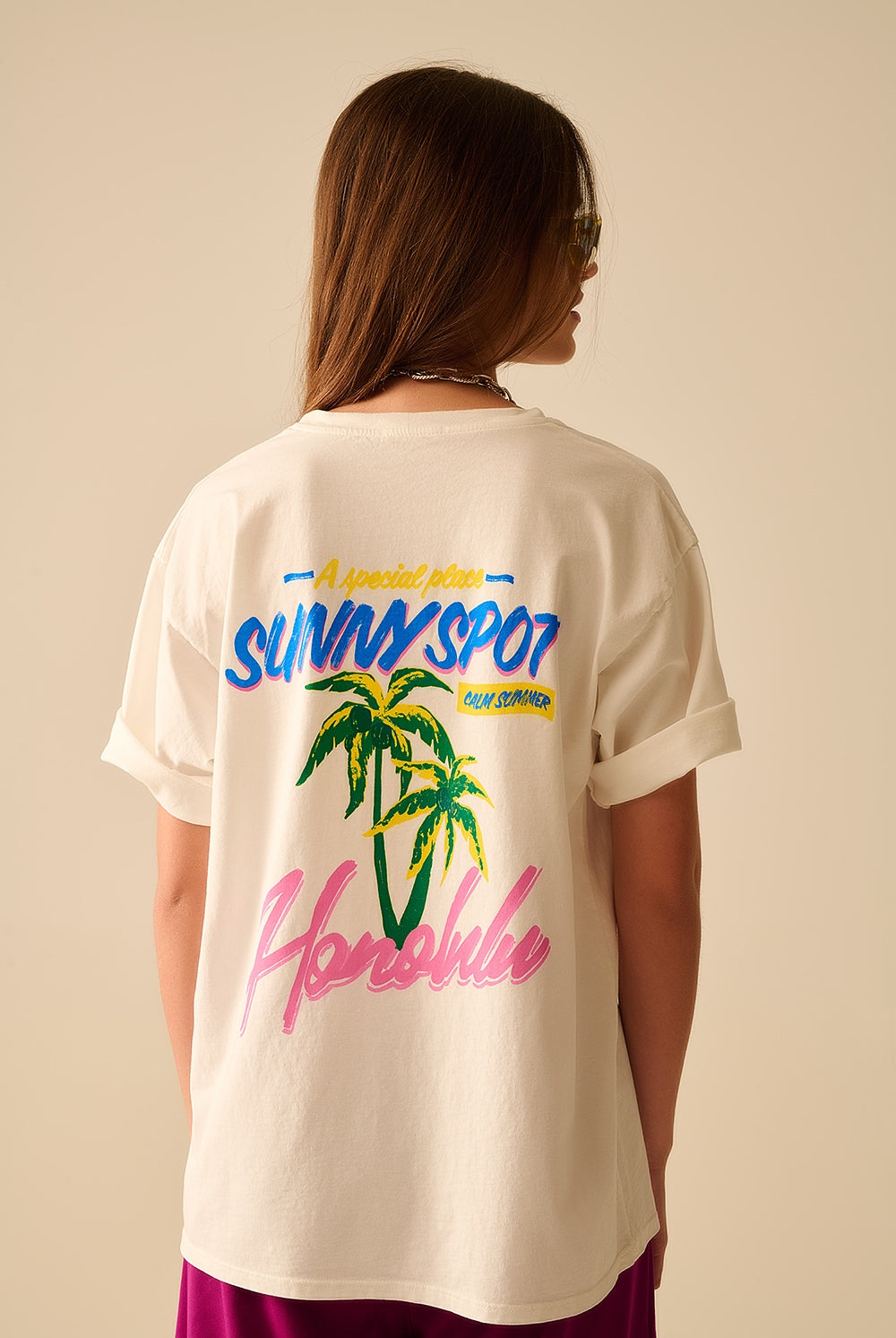 Q2 T-shirt blanc fabriqué en Italie avec graphisme Honolulu