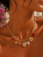 Collier acier inoxydable dore breloques coeurs soleil fleurs

