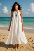 Robe longue à col licou et coutures apparentes en crème