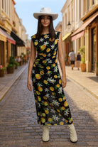 Robe longue en tulle noir avec volant sur le côté en imprimé jaune citron