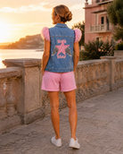 Veste sans manches en jean bleu Rock Star avec plumes roses
