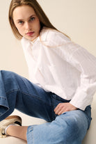 Q2 Blouse blanche à rayures relaxées