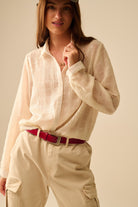 Q2 chemise en mousseline de soie beige avec détails en paillettes