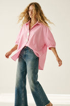 Q2 Chemise rose oversize à boutons argentés en popeline