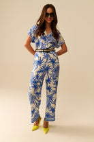 Q2 Combinaison à manches courtes motif tropical en bleu et blanc