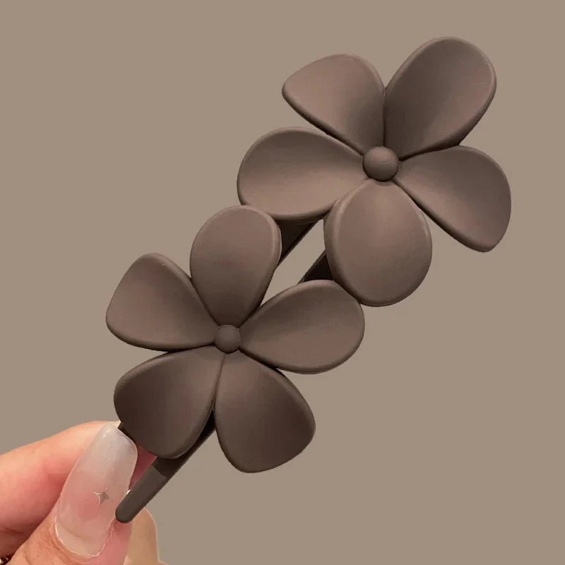 Pince à Cheveux Double Fleurs Façon Peigne – Élégance et Praticité au Quotidien - La boutique de Nannye