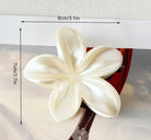 Pince à Cheveux Fleur de Frangipanier – L’Élégance Exotique à Portée de Main - La boutique de Nannye
