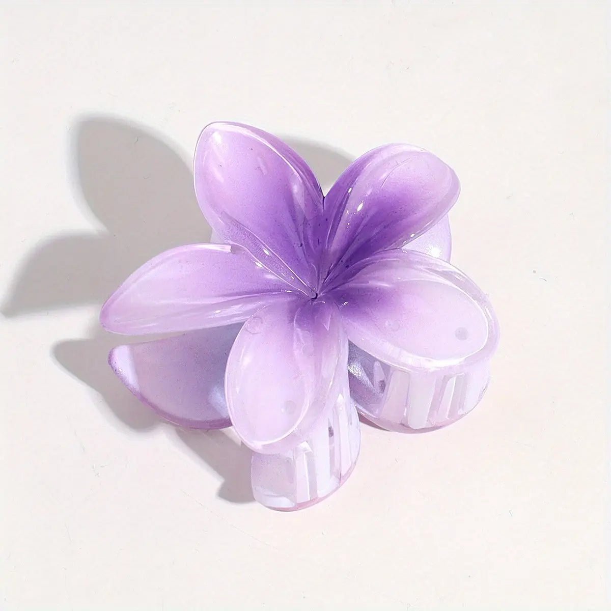 Pince à Cheveux Fleur de Frangipanier – L’Élégance Exotique à Portée de Main - La boutique de Nannye