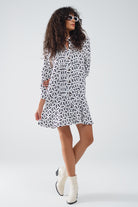 Q2 Robe à col polo à manches longues avec imprimé abstrait