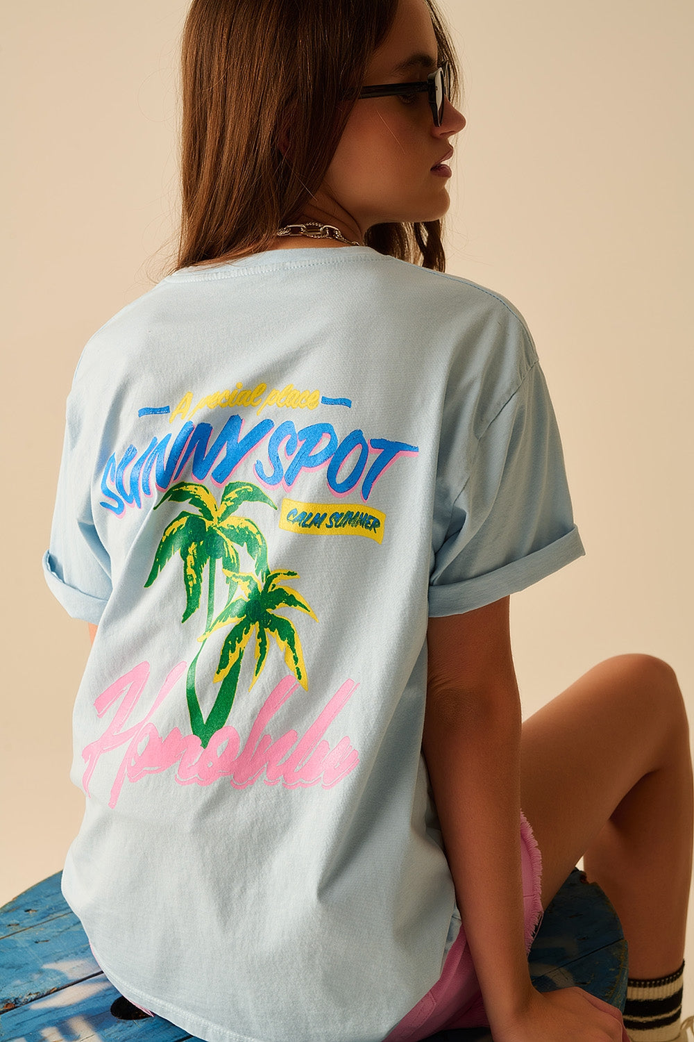 Q2 T-shirt bleu fabriqué en Italie avec graphisme Honolulu