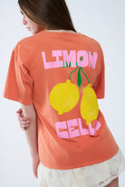 Q2 t-shirt décontracté orange avec imprimé citron