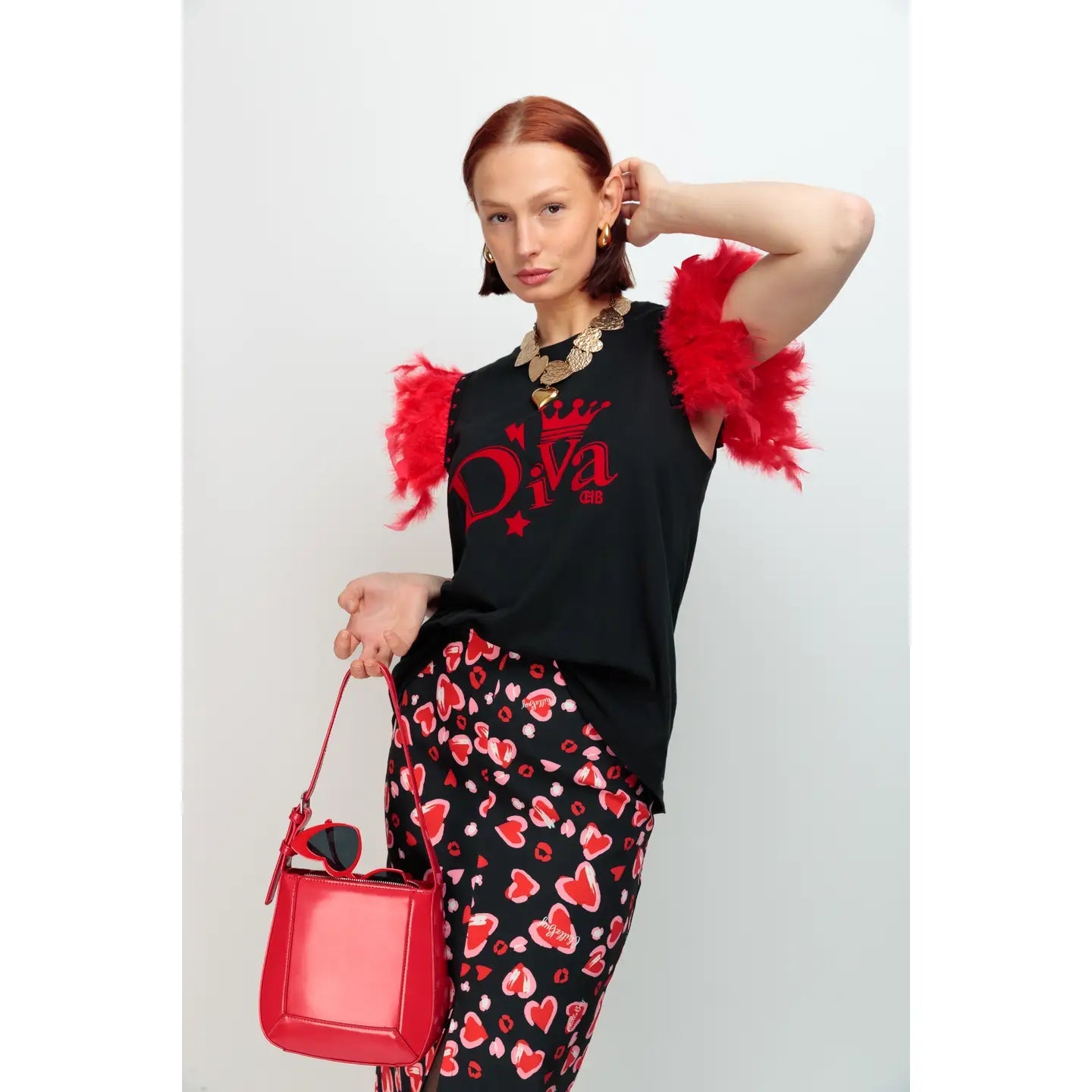 T-shirt Femme Plumes+Clous DIVA : Style audacieux et attitude assurée - La boutique de Nannye