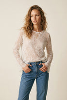 Q2 top transparent à manches longues en dentelle blanche avec détail floral